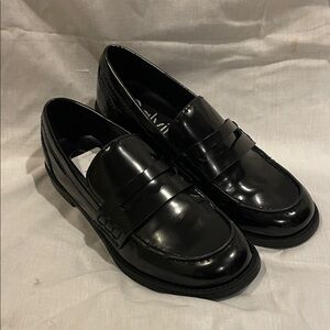 Calvin Klein Classic Black patent leather penny Loafers.  Woman’s size 7.5.